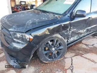 2013 Dodge Durango R/T z VIN 1C4SDHCT5DC558951, wystawiony jako IAAI lot #41590515 z przebiegiem 150 985 mil mil oraz . Historia ofert i sprzedaży dostępna na DreamBid. Obrazek 6.