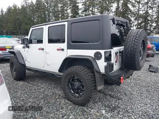 2014 Jeep Wrangler Unlimited Sahara with VIN 1C4BJWEG1EL127232, listed as a IAAI auction lot 41847368 with 109,975 mi miles. Bid and sale history available at carsss.com. Image 3.