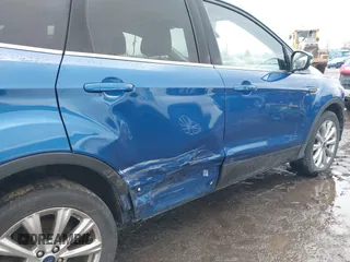 2017 Ford Escape Titanium with VIN 1FMCU9JD8HUA59000, listed as a IAAI auction lot 41559788 with 90,319 mi miles. Bid and sale history available at carsss.com. Image 17.