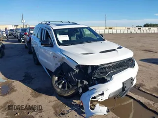 2023 Dodge Durango R/T Plus z VIN 1C4SDHCT5PC589797, wystawiony jako IAAI lot #41472148 z przebiegiem 34 980 mil mil oraz . Historia ofert i sprzedaży dostępna na DreamBid. Obrazek 1.