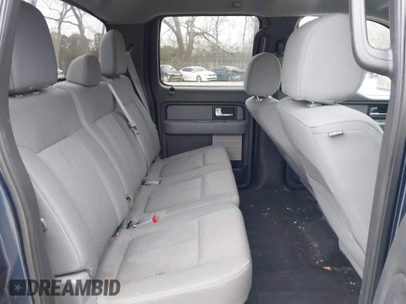 2013 Ford F-150 XL with VIN 1FTFW1EF0DFB64914, listed as a IAAI auction lot 41374294 with 186,000 mi miles. Bid and sale history available at carsss.com. Image 8.