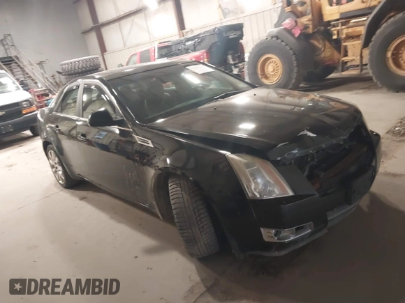2009 Cadillac CTS AWD w/1SB with VIN 1G6DT57V290152885, listed as a IAAI auction lot 42063192 with 146,119 mi miles. Bid and sale history available at carsss.com. Image 1.