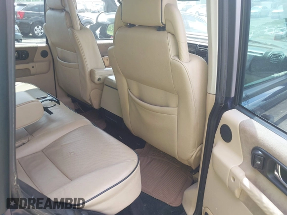 2003 Land Rover Discovery with VIN SALTR16483A787662, listed as a IAAI auction lot 42140472 with 122,446 mi miles and . Bid and sale history available at DreamBid. Image 8.