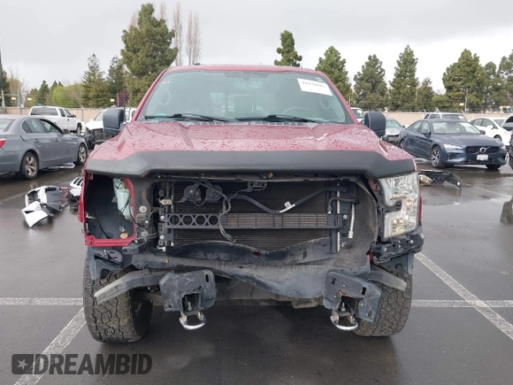 2015 Ford F-150 XLT with VIN 1FTEW1E89FFB76849, listed as a IAAI auction lot 41936016 with 107,773 mi miles and . Bid and sale history available at carsss.com. Image 13.