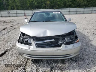 2001 Toyota Camry CE z VIN 4T1BG22K91U053266, wystawiony jako Copart lot #56991785 z przebiegiem 130 502 mil mil oraz Szkody całkowita. Historia ofert i sprzedaży dostępna na DreamBid. Obrazek 5.