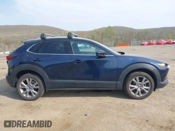 2021 Mazda CX-30 Premium with VIN 3MVDMBDM4MM238367, listed as a IAAI auction lot 42124335 with 31,120 mi miles and . Bid and sale history available at DreamBid. Image 13.