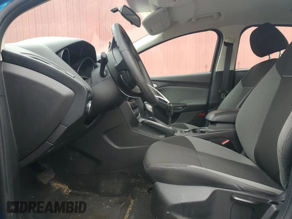2013 Ford Focus SE z VIN 1FADP3F21DL310739, wystawiony jako Copart lot #57679325 z przebiegiem 225 860 mil mil oraz Czysty tytuł • Clean title. Historia ofert i sprzedaży dostępna na DreamBid. Obrazek 7.