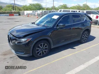 2018 Mazda CX-5 Touring z VIN JM3KFACM5J0309533, wystawiony jako IAAI lot #42195429 z przebiegiem 91 928 mil mil oraz . Historia ofert i sprzedaży dostępna na DreamBid. Obrazek 17.