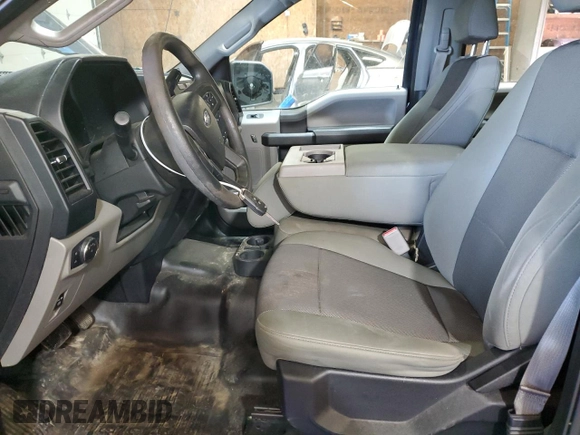 2015 Ford F-150 XLT with VIN 1FTEW1EP2FFC73690, listed as a Copart auction lot 61154355 with 145,389 mi miles and Salvage title. Bid and sale history available at DreamBid. Image 7.