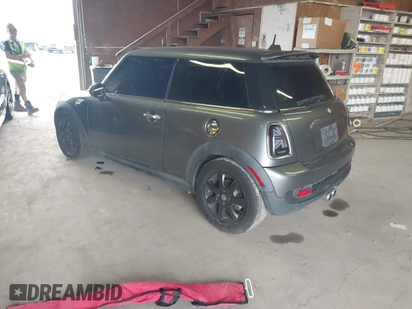 2009 MINI Hardtop S with VIN WMWMF73539TT98930, listed as a IAAI auction lot 42439606 with 152,954 mi miles and . Bid and sale history available at DreamBid. Image 3.