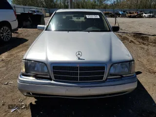 1995 Mercedes-Benz C with VIN WDBHA28E7SF255142, listed as a Copart auction lot 68411704 with 334,000 mi miles and Salvage Title. Bid and sale history available at carsss.com. Image 5.