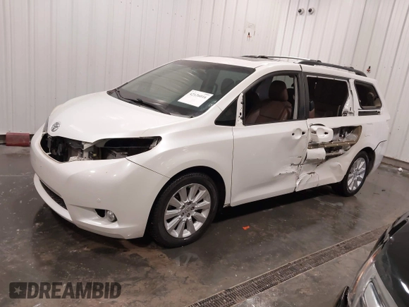 2015 Toyota Sienna XLE with VIN 5TDYK3DC3FS532593, listed as a IAAI auction lot 42126016 with 80,843 mi miles and . Bid and sale history available at DreamBid. Image 2.