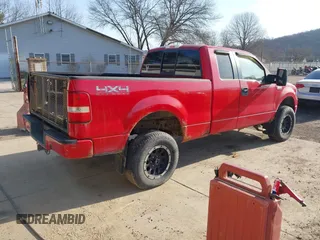 2005 Ford F-150 STX with VIN 1FTRX14W35NA68052, listed as a IAAI auction lot 41768704 with 146,336 mi miles. Bid and sale history available at carsss.com. Image 4.
