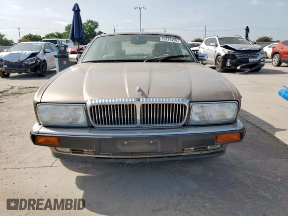 1994 Jaguar XJ с VIN SAJKX174XRC692378, выставлен на аукционе Copart как лот 65275795 с пробегом 80 748 миль миль и Чистый • Clean title. История ставок и продаж доступна на DreamBid. Изображение 5.