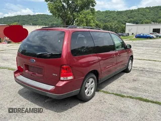 2005 Ford Freestar SES с VIN 2FMZA57605BA82597, выставлен на аукционе Copart как лот 61200505 с пробегом 188 210 миль миль и Чистый • Clean title. История ставок и продаж доступна на DreamBid. Изображение 4.