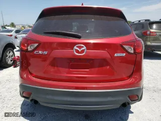 2016 Mazda CX-5 Sport with VIN JM3KE2BY1G0634797, listed as a Copart auction lot 54572155 with 170,164 mi miles and Clean Title. Bid and sale history available at carsss.com. Image 6.