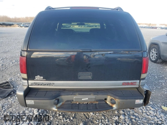 2000 GMC Jimmy SLE Convenience z VIN 1GKDT13W7Y2393191, wystawiony jako Copart lot #82301364 z przebiegiem 160 004 mil mil oraz Czysty tytuł • Clean title. Historia ofert i sprzedaży dostępna na DreamBid. Obrazek 6.