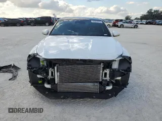 2023 Genesis G70 2.0T with VIN KMTG34TA4PU104576, listed as a Copart auction lot 85082044 with 28,821 mi miles and Salvage Title. Bid and sale history available at DreamBid. Image 5.