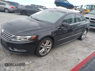 2014 Volkswagen CC Lux with VIN WVWRP7AN3EE537770, listed as a IAAI auction lot 41385247 with 135,069 mi miles. Bid and sale history available at carsss.com. Image 2.