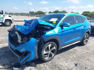 2017 Hyundai Tucson Value with VIN KM8J33A23HU540472, listed as a IAAI auction lot 41935056 with 58,937 mi miles. Bid and sale history available at carsss.com. Image 2.