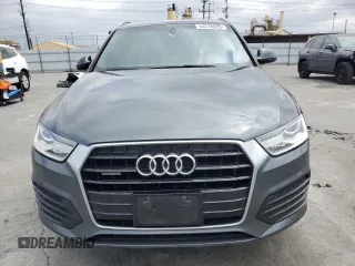 2018 Audi Q3 Premium with VIN WA1ECCFS8JR002738, listed as a Copart auction lot 53276095 with 171,912 mi miles and Salvage title. Bid and sale history available at DreamBid. Image 5.