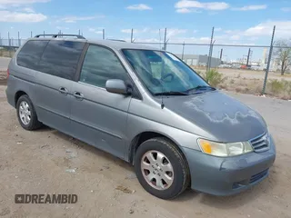 2002 Honda Odyssey EX with VIN 5FNRL18652B005289, listed as a IAAI auction lot 42587382 with 231,491 mi miles and . Bid and sale history available at DreamBid. Image 1.