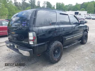 2002 Chevrolet Tahoe LS with VIN 1GNEC13V12J329045, listed as a IAAI auction lot 42099926 with 266,291 mi miles and . Bid and sale history available at DreamBid. Image 4.