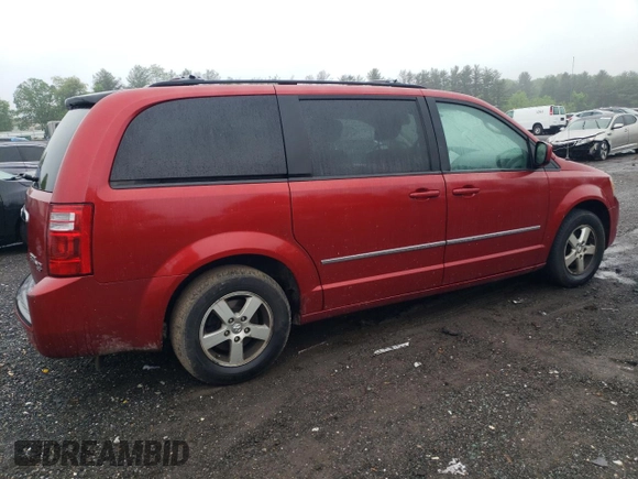 2010 Dodge Grand Caravan SXT z VIN 2D4RN5D10AR179773, wystawiony jako Copart lot #56855235 z przebiegiem 239 925 mil mil oraz Nie do naprawy • Non repairable. Historia ofert i sprzedaży dostępna na DreamBid. Obrazek 3.