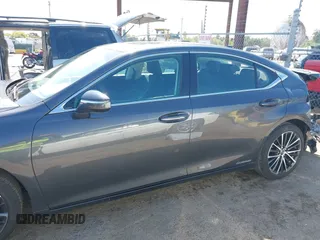 2022 Lexus ES 300h with VIN 58ADA1C15NU026266, listed as a IAAI auction lot 42121610 with 18,059 mi miles and . Bid and sale history available at DreamBid. Image 14.