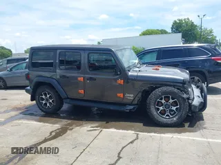 2019 Jeep Wrangler Unlimited Sport S with VIN 1C4HJXDN4KW577273, listed as a IAAI auction lot 42435847 with 69,403 mi miles and . Bid and sale history available at DreamBid. Image 13.