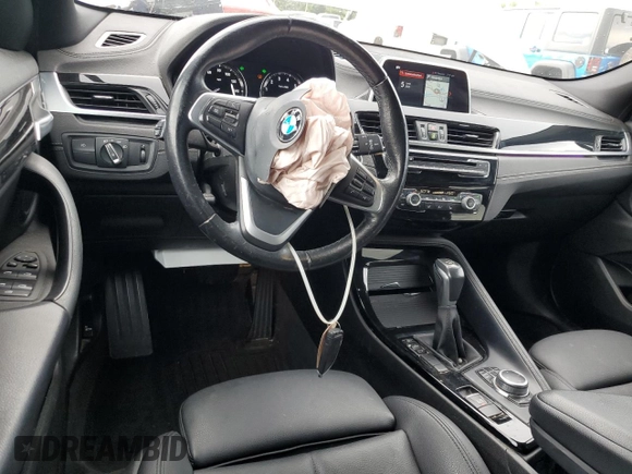 2018 BMW X2 sDrive28i with VIN WBXYJ3C39JEJ82814, listed as a Copart auction lot 59498615 with 74,550 mi miles and Salvage title. Bid and sale history available at DreamBid. Image 8.