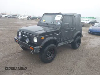 1986 Suzuki Samurai z VIN JS4JC51C4G4118117, wystawiony jako IAAI lot #41589925 z przebiegiem 70 607 mil mil oraz . Historia ofert i sprzedaży dostępna na DreamBid. Obrazek 2.
