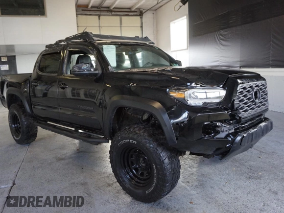 2021 Toyota Tacoma SR z VIN 3TMCZ5AN3MM420851, wystawiony jako Copart lot #55668255 z przebiegiem 61 329 mil mil oraz Szkoda całkowita • Salvage title. Historia ofert i sprzedaży dostępna na DreamBid. Obrazek 1.