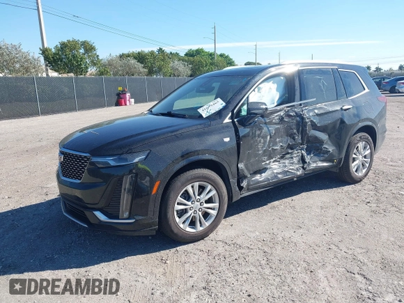 2021 Cadillac XT6 Luxury with VIN 1GYKPAR48MZ171154, listed as a IAAI auction lot 41639465 with 41,183 mi miles. Bid and sale history available at carsss.com. Image 2.