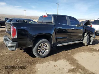 2019 GMC Canyon 4WD SLT with VIN 1GTG6DEN9K1213552, listed as a Copart auction lot 87034594 with 134,185 mi miles and Salvage Title. Bid and sale history available at carsss.com. Image 3.