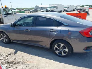 2019 Honda Civic Sedan LX with VIN 19XFC2F63KE025722, listed as a IAAI auction lot 42045594 with 57,290 mi miles. Bid and sale history available at carsss.com. Image 14.