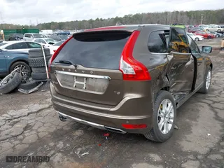 2015 Volvo XC60 T5 Drive-E Premier with VIN YV440MDK8F2681703, listed as a IAAI auction lot 41730228 with 112,738 mi miles. Bid and sale history available at carsss.com. Image 4.