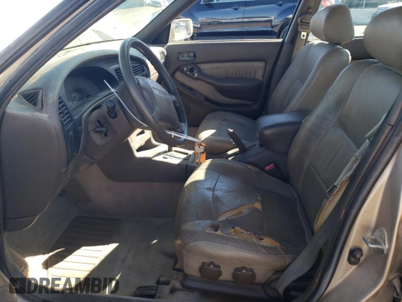 1996 Toyota Camry DX with VIN 4T1BG12K0TU744733, listed as a Copart auction lot 45302005 with 136,736 mi miles and Salvage Title. Bid and sale history available at carsss.com. Image 7.