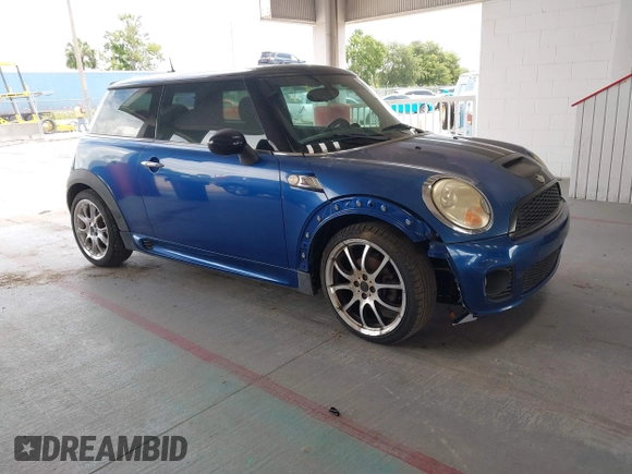 2007 MINI Hardtop S with VIN WMWMF73557TT86128, listed as a IAAI auction lot 42417311 with 114,911 mi miles and . Bid and sale history available at DreamBid. Image 1.