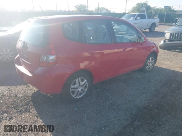 2007 Honda Fit with VIN JHMGD38497S064174, listed as a IAAI auction lot 42038262 with 74,580 mi miles. Bid and sale history available at carsss.com. Image 4.