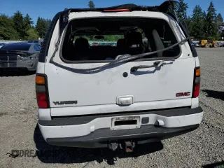 2005 GMC Yukon Denali z VIN 1GKEK63U55J143324, wystawiony jako Copart lot #59000695 z przebiegiem Nie podano mil oraz Szkoda całkowita • Salvage title. Historia ofert i sprzedaży dostępna na DreamBid. Obrazek 6.