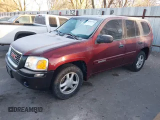2005 GMC Envoy SLT with VIN 1GKDT13S452115924, listed as a IAAI auction lot 41443704 with 215,402 mi miles. Bid and sale history available at carsss.com. Image 2.