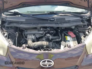 2012 Scion iQ with VIN JTNJJXB0XCJ021245, listed as a IAAI auction lot 42463167 with 158,901 mi miles and . Bid and sale history available at DreamBid. Image 10.