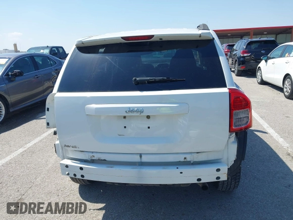 2011 Jeep Compass Latitude with VIN 1J4NT1FB2BD236439, listed as a IAAI auction lot 41935842 with 164,893 mi miles. Bid and sale history available at carsss.com. Image 17.
