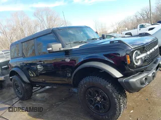 2023 Ford Bronco with VIN 1FMEE5DP9PLB82362, listed as a IAAI auction lot 41443809 with 13,567 mi miles and . Bid and sale history available at DreamBid. Image 13.