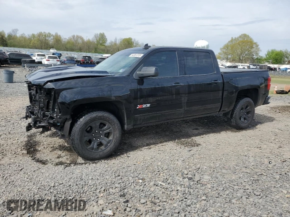 2018 Chevrolet Silverado 1500 LTZ with VIN 3GCUKSEC3JG247598, listed as a Copart auction lot 54361315 with 61,339 mi miles and Salvage Title. Bid and sale history available at DreamBid. Image 1.