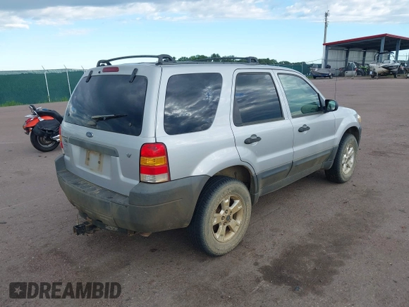 2006 Ford Escape XLT with VIN 1FMYU93186KC23802, listed as a IAAI auction lot 42611582 with 166,871 mi miles and . Bid and sale history available at DreamBid. Image 4.