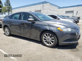 2017 Ford Fusion SE with VIN 3FA6P0H77HR247699, listed as a Copart auction lot 63482525 with 129,736 mi miles and Clean title. Bid and sale history available at DreamBid. Image 4.