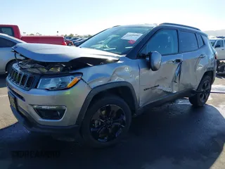 2018 Jeep Compass Latitude with VIN 3C4NJDBB6JT299247, listed as a IAAI auction lot 41591106 with 48,685 mi miles. Bid and sale history available at carsss.com. Image 2.
