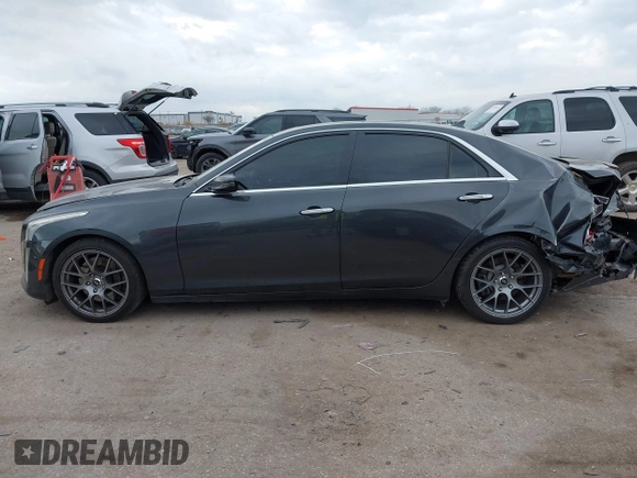 2014 Cadillac CTS Vsport Premium RWD z VIN 1G6AV5S8XE0175517, wystawiony jako IAAI lot #41126885 z przebiegiem 140 667 mil mil oraz . Historia ofert i sprzedaży dostępna na DreamBid. Obrazek 14.
